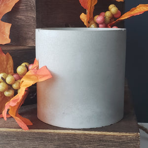 Open image in slideshow, My cement candles are hand-poured/made artisan concrete containers. This vessel has a matte natural finish. It has a beautiful natural stone color of this vessel. My containers help create a pleasant ambiance in your humble abode. It adds an earthy tone to your décor.
